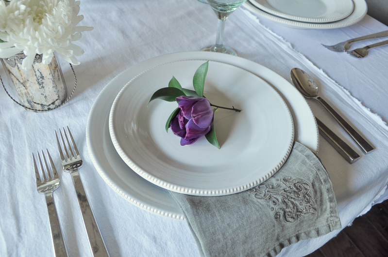 Place Setting with Flower Tablescape Dining Room Gray Linen Napk