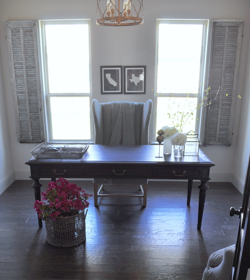 Sophisticated Home Office with Black Desk and Vintage Gray Shutt