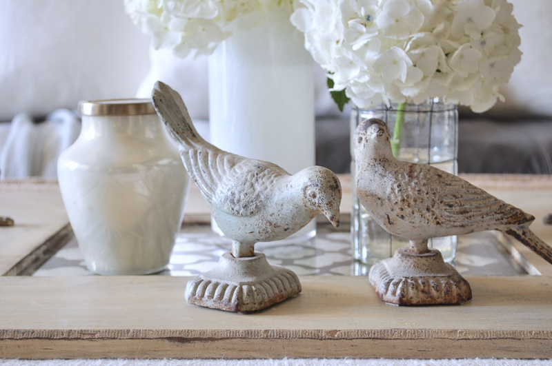 Coffee Table Vignette with Hydangeas Birds Statues and Tray