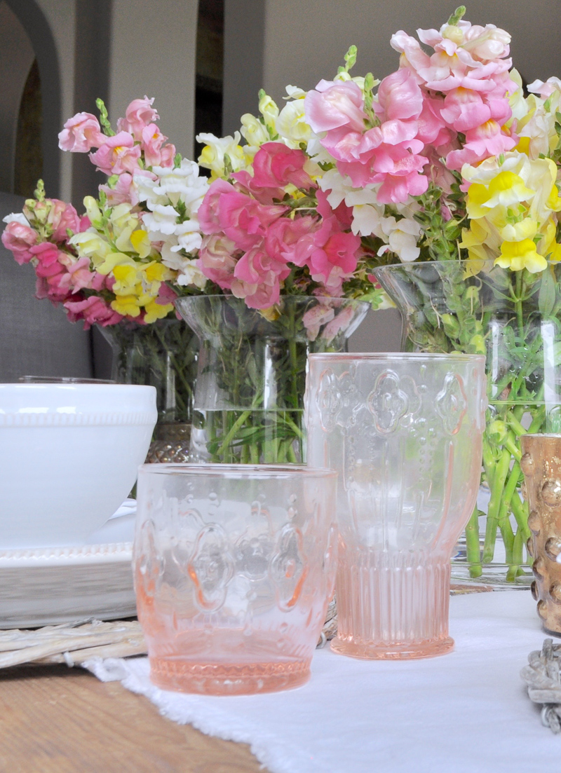 Dining Room Table Setting with Pink Glass