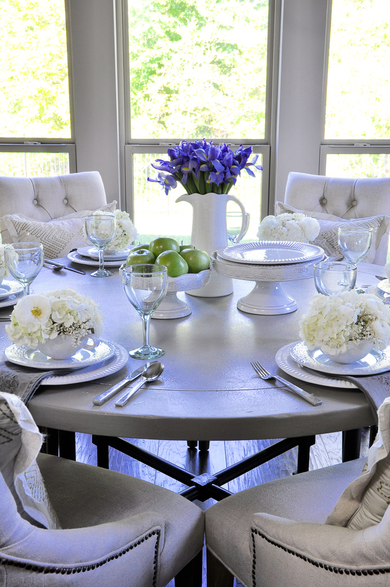 beautiful table setting with spring flowers and white dishes-4