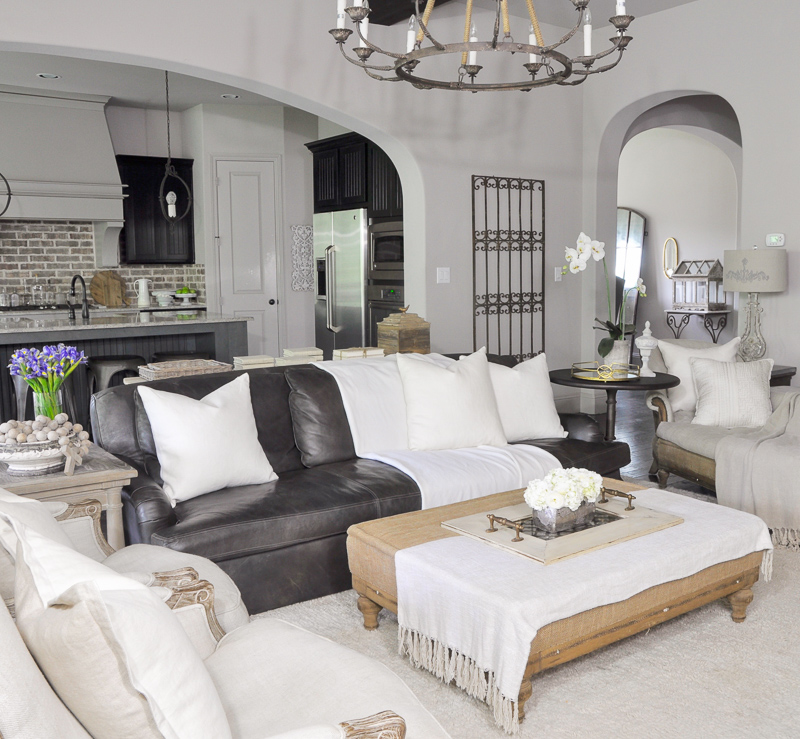 Family Room with Leather Sofa and Linen Chairs