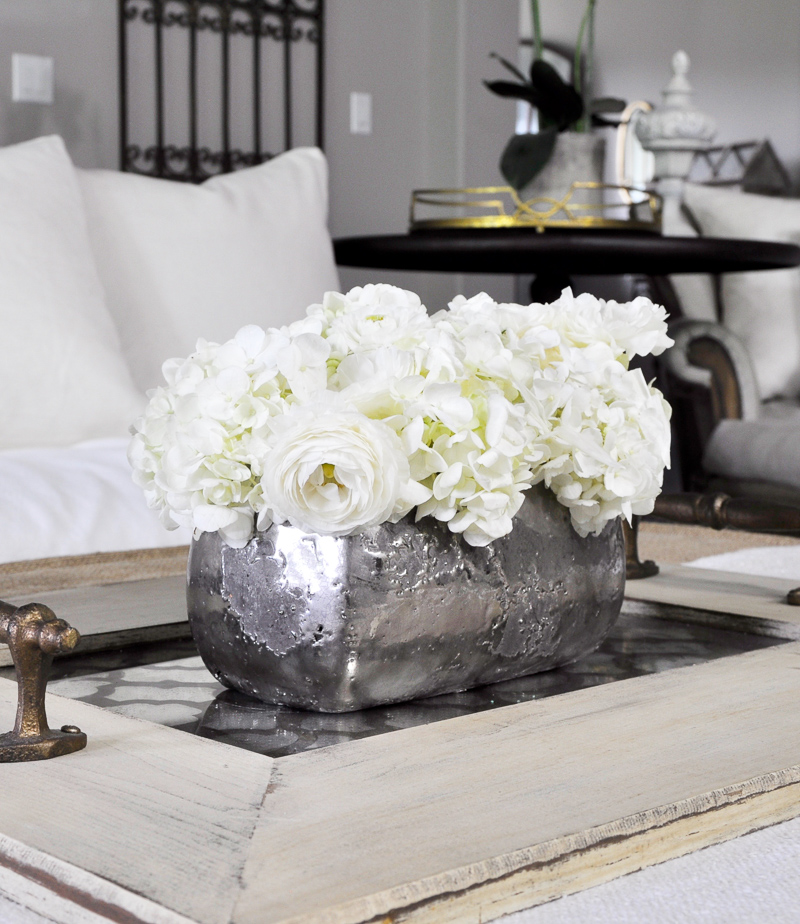 Gorgeous Metallic Pot on Tray on an Ottoman_