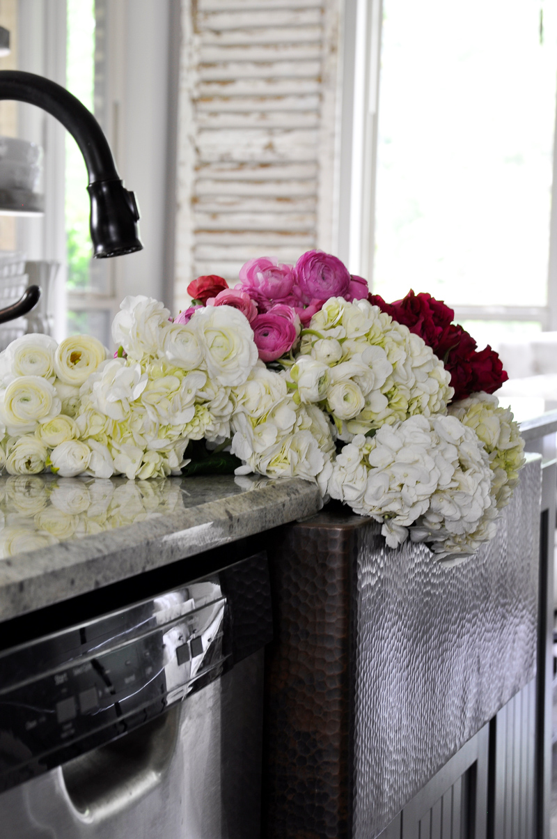 Gorgeous Kitchen Flowers in Copper Sink