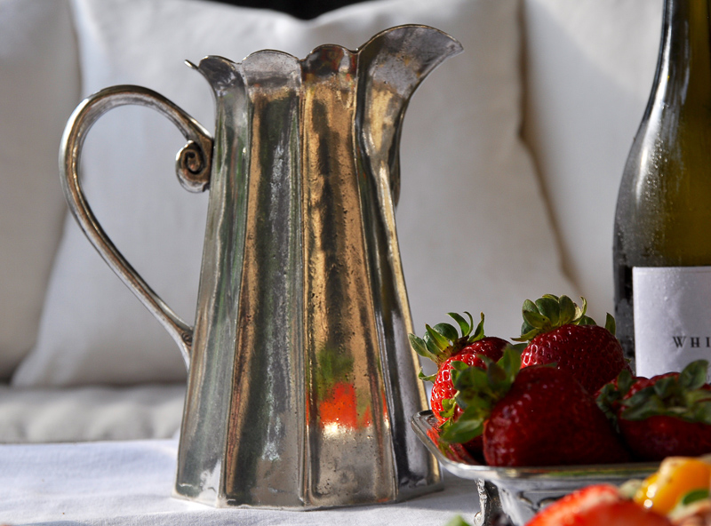 Outdoor patio dinner with flowers white dinnerware and pewter and beautiful salads and fruit-14