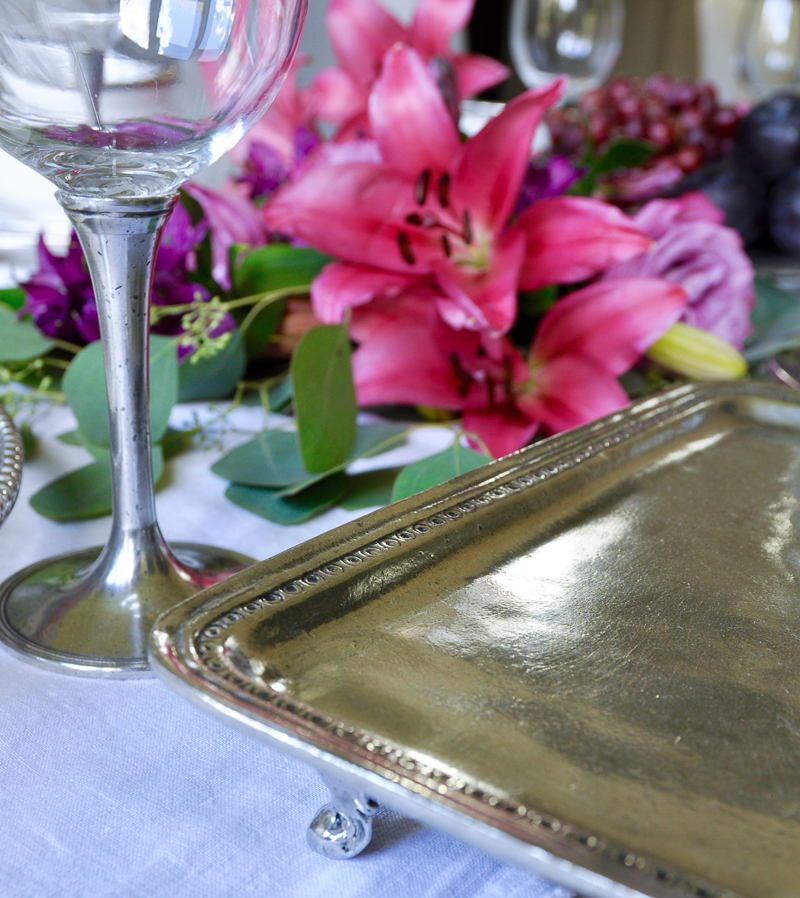 pewter serverware set for a dinner party with beautiful, large floral design