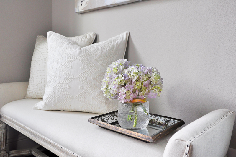 Beautiful white pillow on bench_