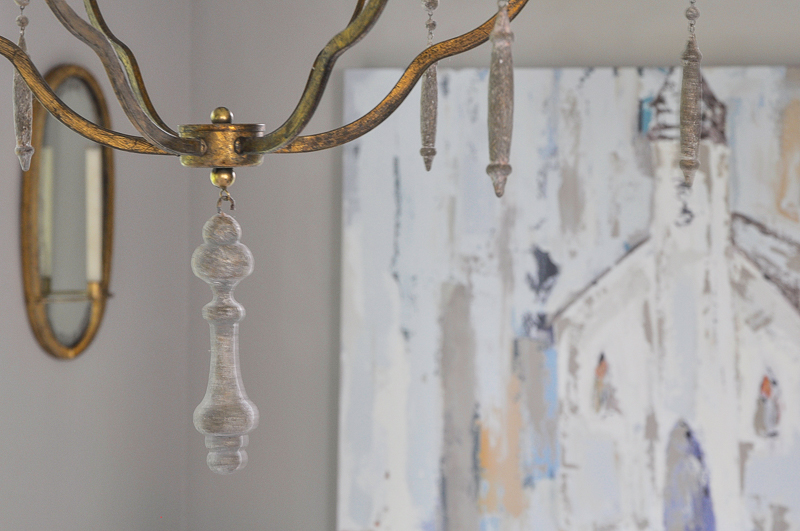 Elegant gold chandelier with wood beads_