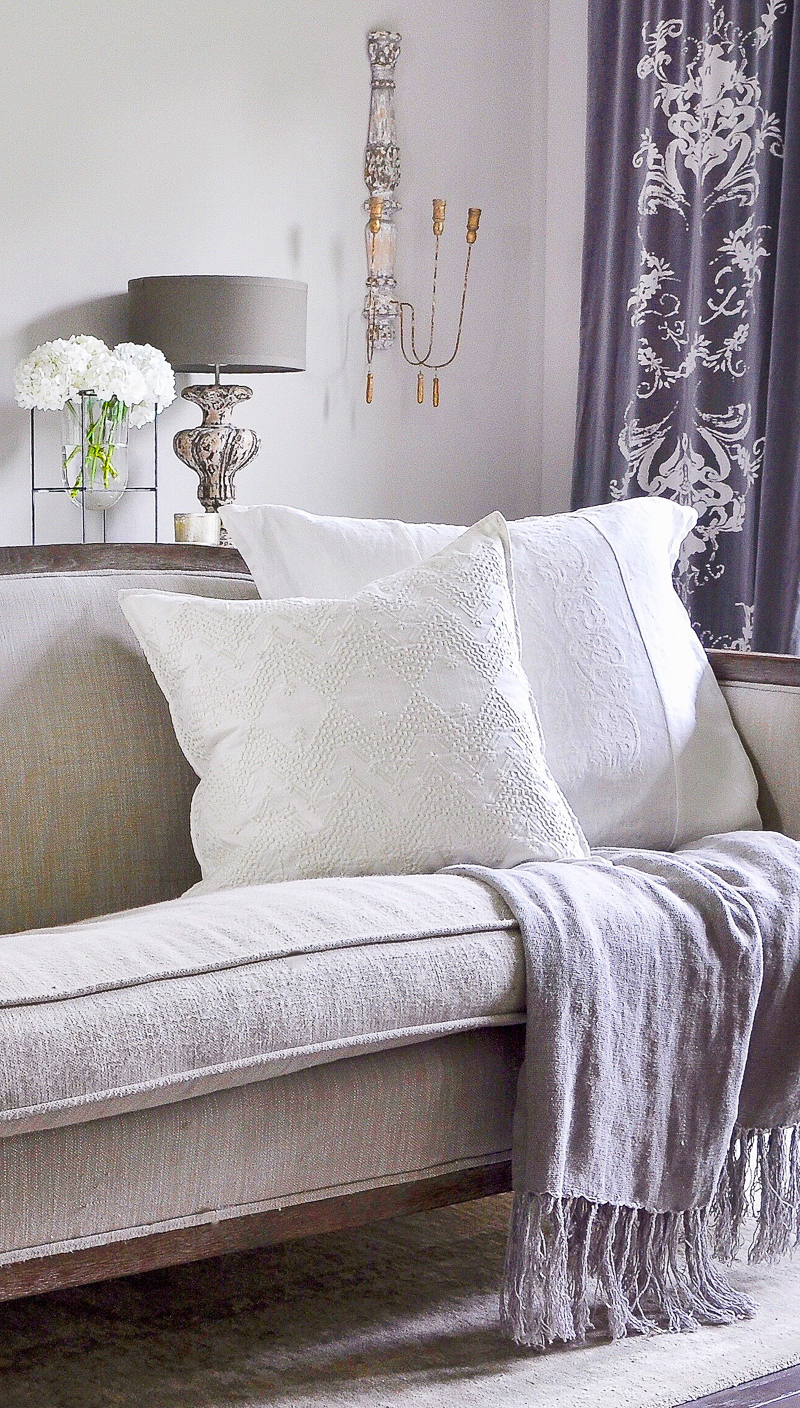 beautiful white pillow in gray and white bedroom_