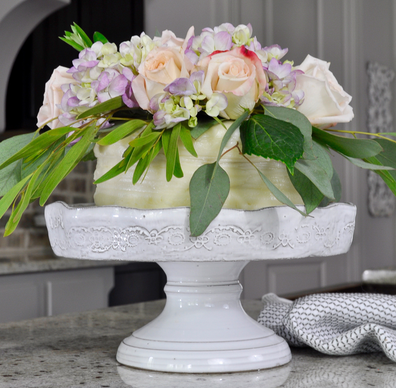 gorgeous decorated grocery store cake on white anthropologie cake stand_-2