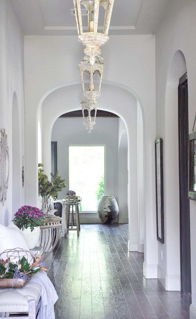 arched-entry-hall-with-pendants-decorated-for-fall-home-tour