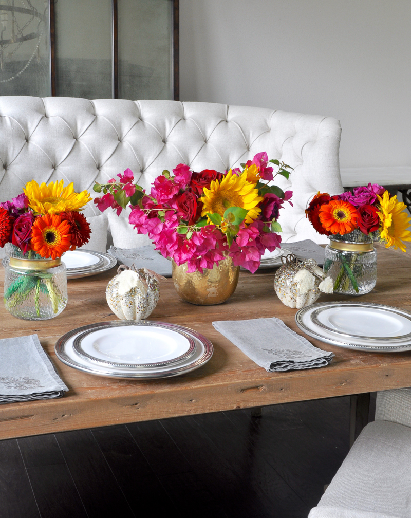 bright-floral-centerpiece-in-a-neutral-dining-room