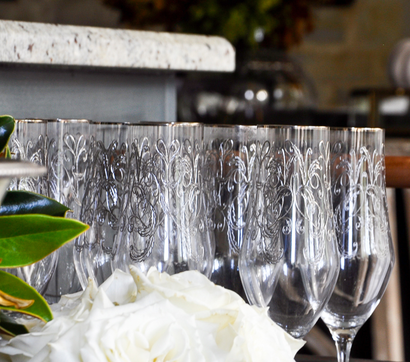 beautiful-champagne-glasses-on-bar-cart_