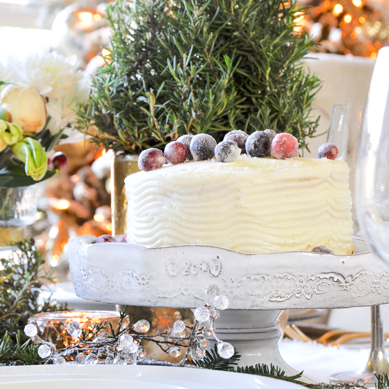 classic-christmas-table-with-white-cake-and-sugared-cranberries