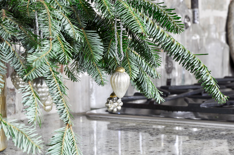 evergreen-branches-with-ornaments