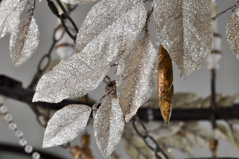 gold-leaves-on-chandelier-decorated-for-christmas_