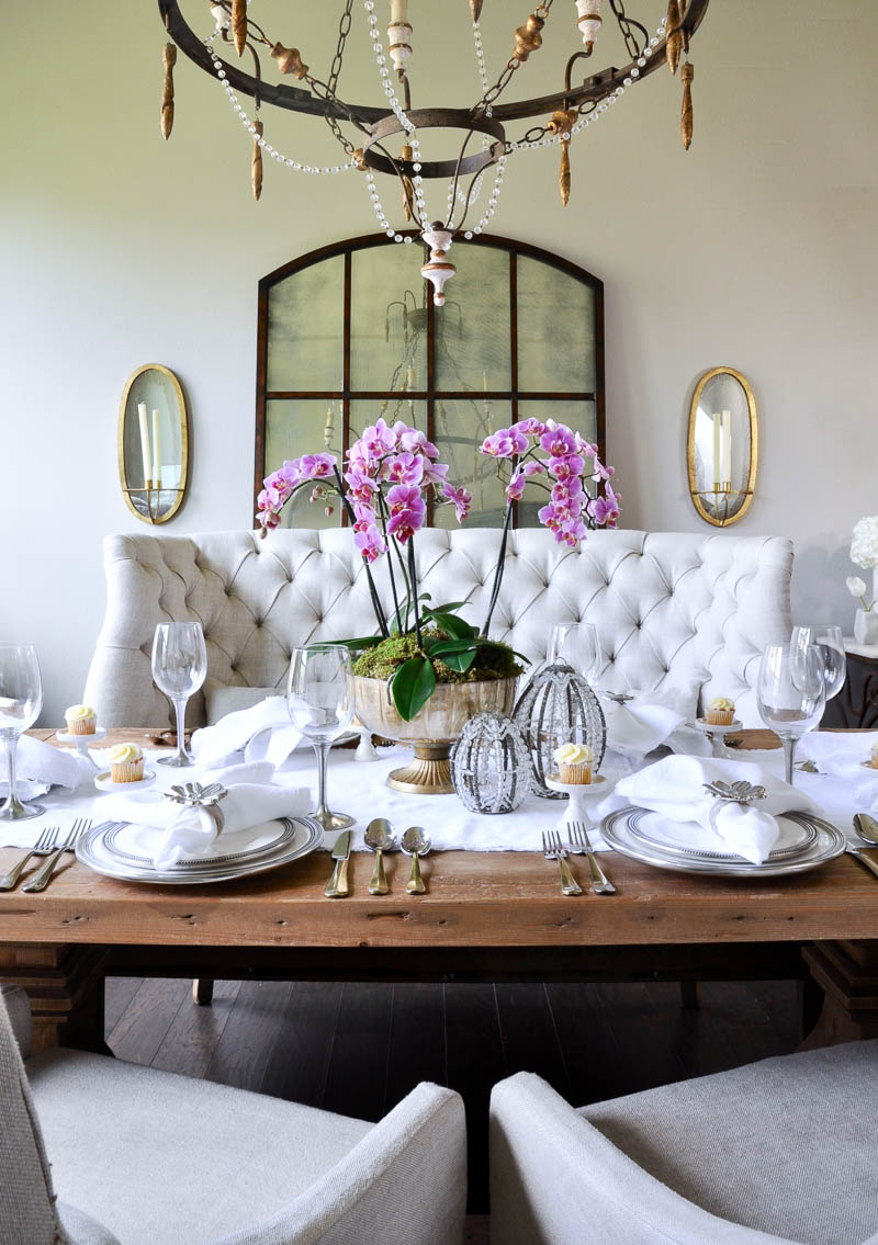 orchid arrangement on dining table