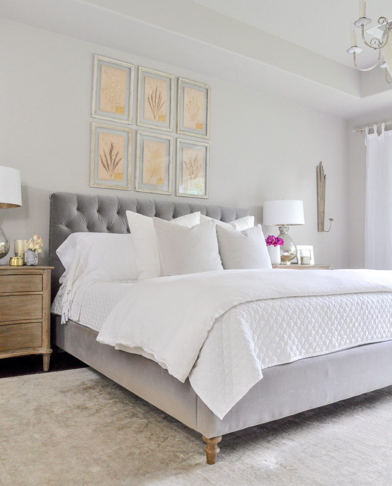 gray tufted bed