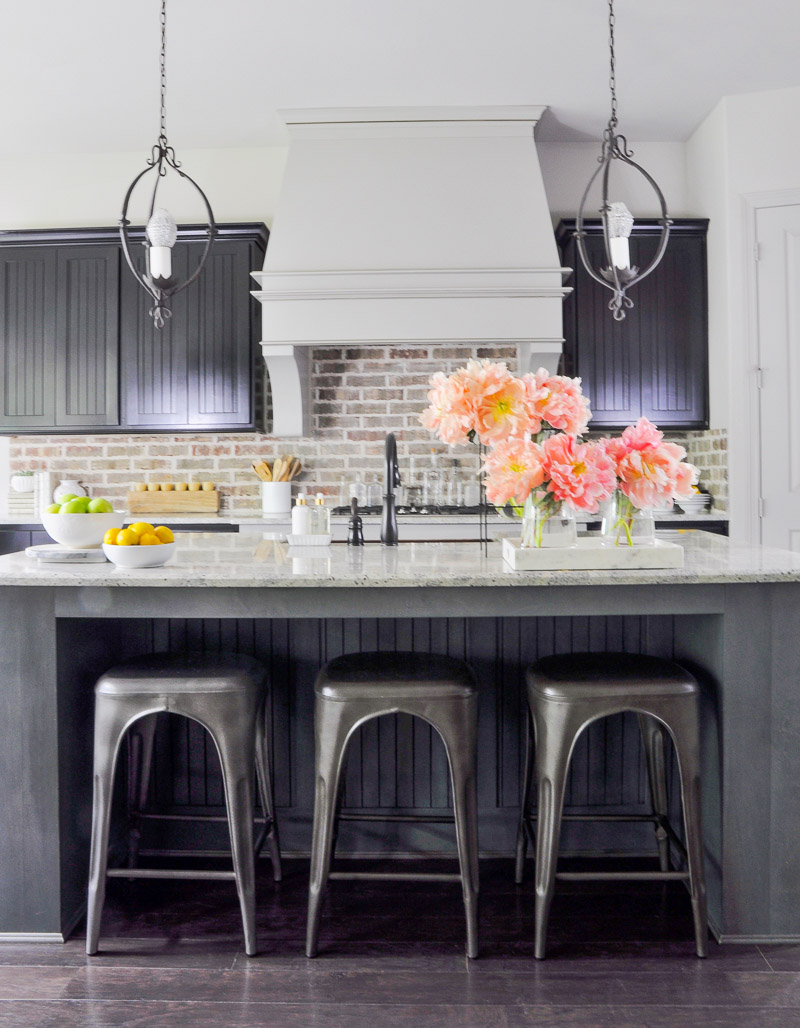 beautiful kitchen large vent hood