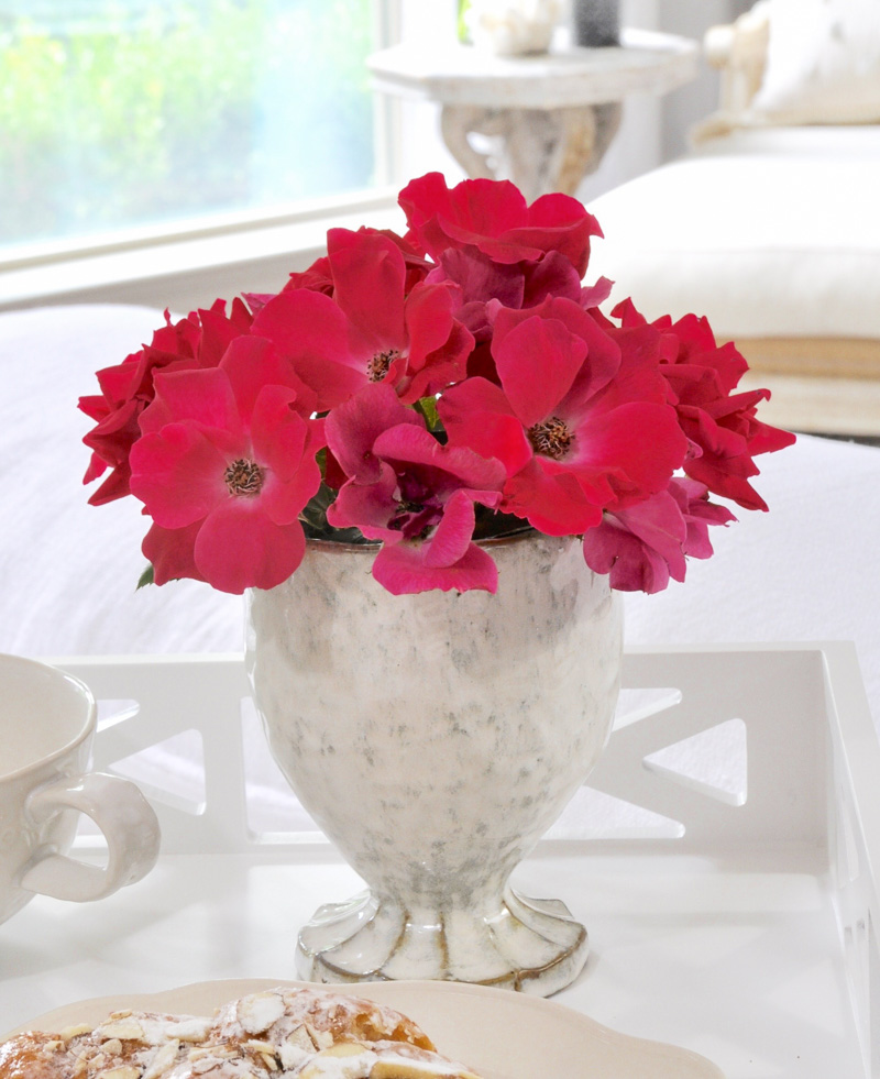 vase of flowers on breakfast tray