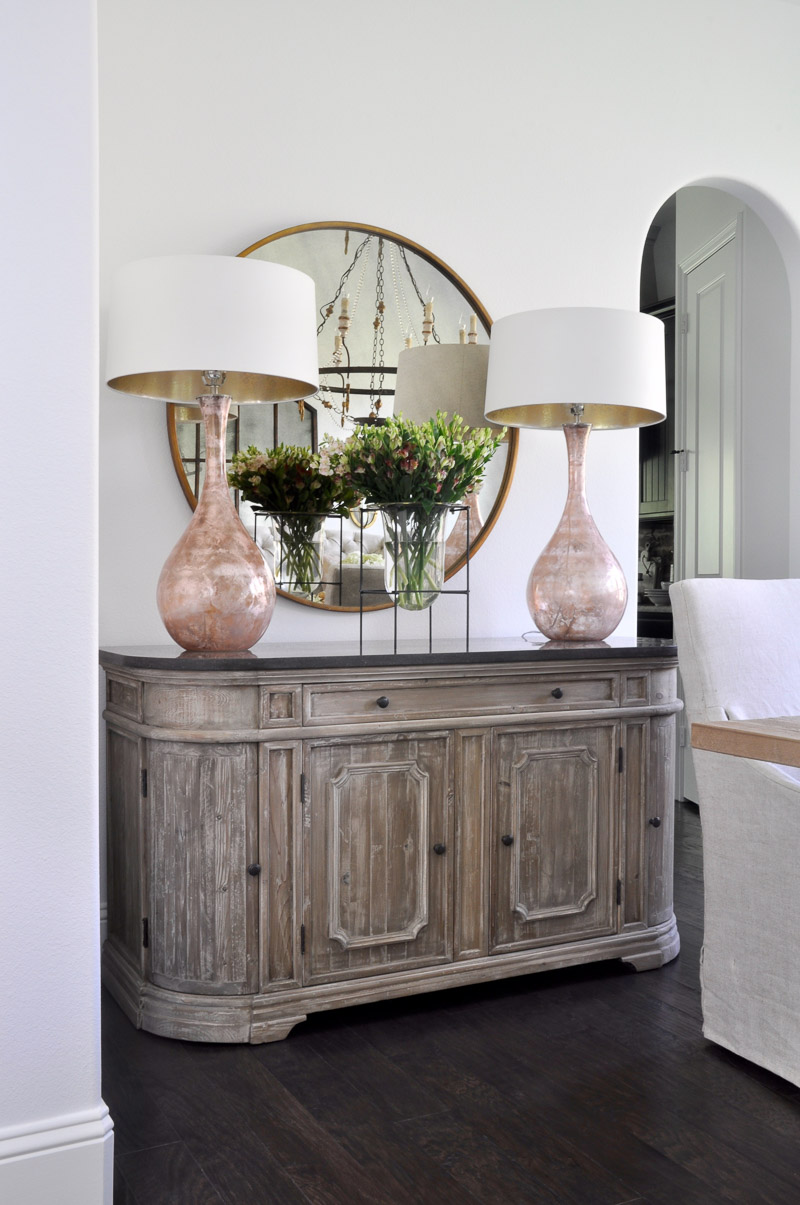 beautiful updated dining room with sideboard