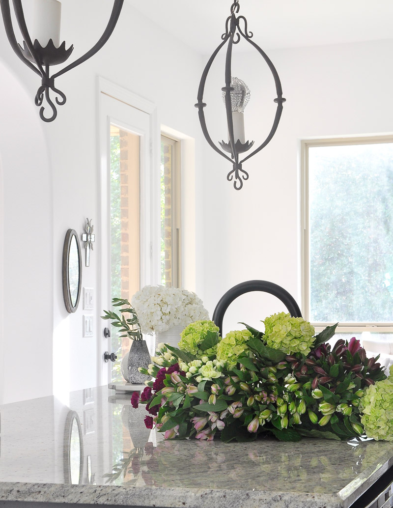 kitchen with flowers in an inviting home