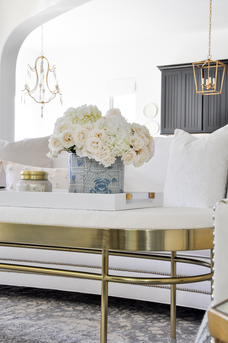 elegant white living room with gold