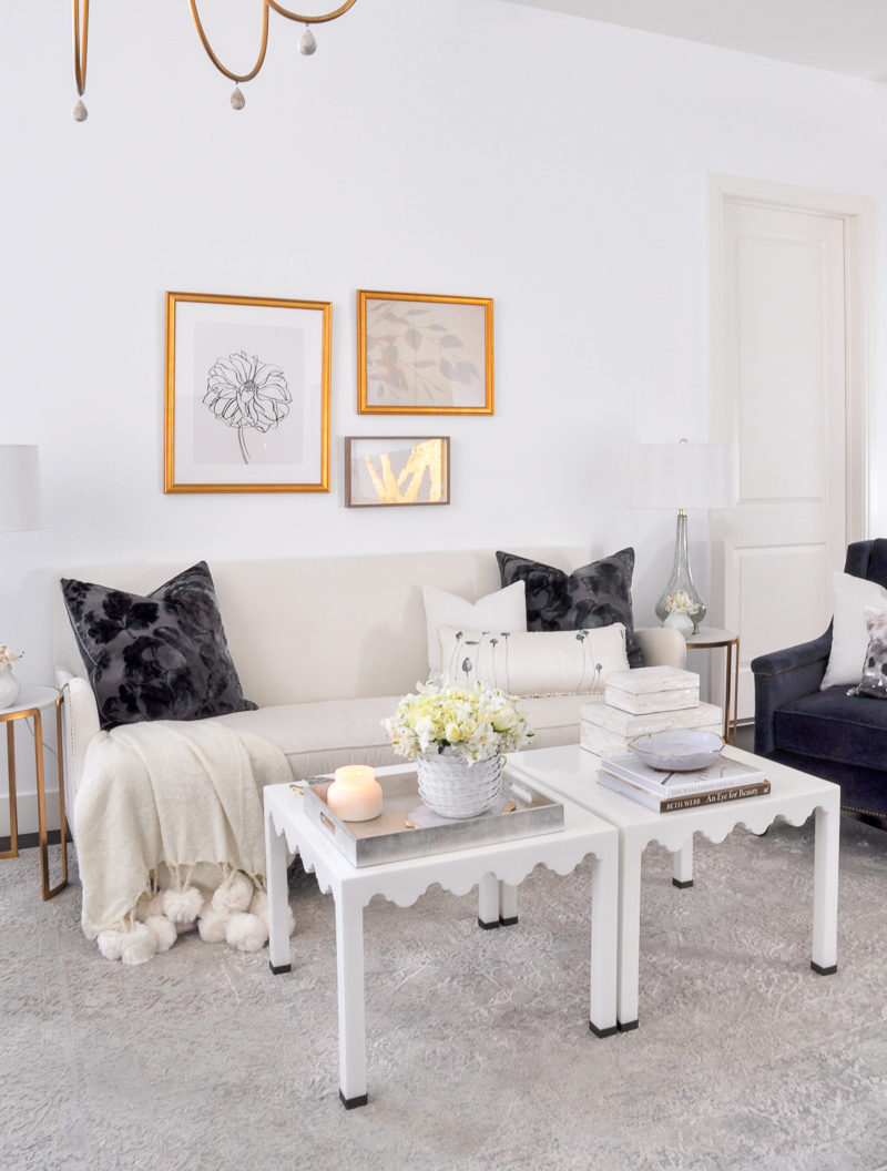 beautiful white living room with gold accents