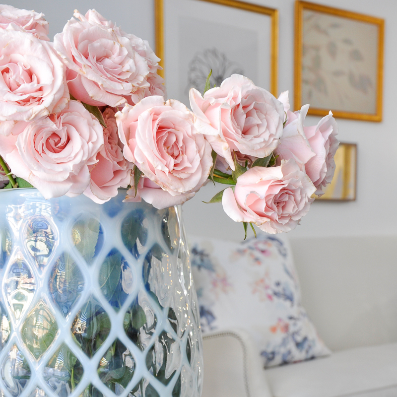 beautiful white living room with spring flowers