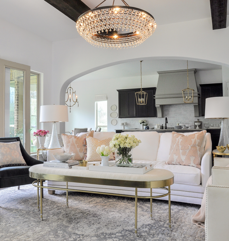 blush accents in a white living room decorated for spring