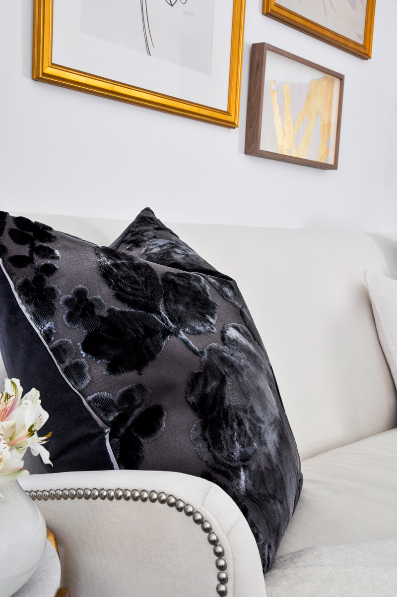 burnout velvet pillow navy on white sofa