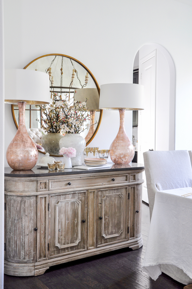 dining room sideboard with blush and white spring decor