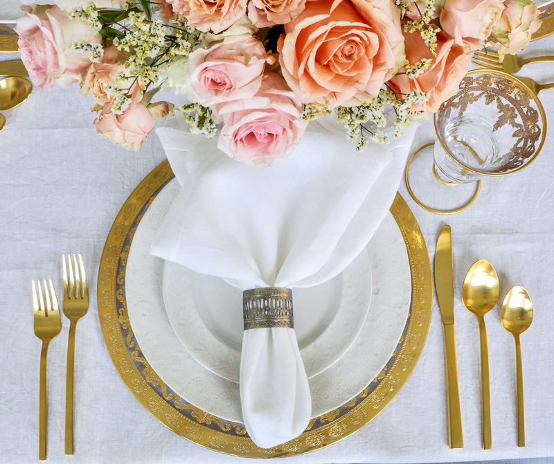 gorgeous gold and white and peach place setting