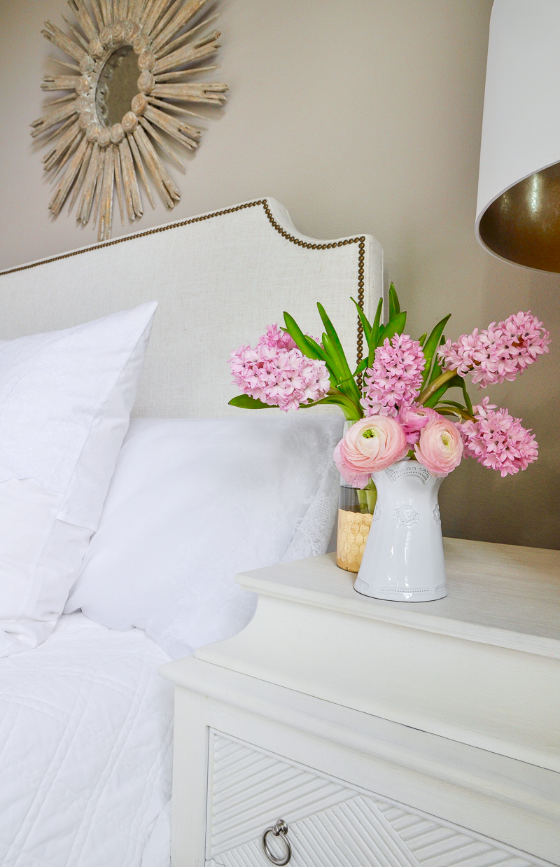 guest bedroom with white bedding