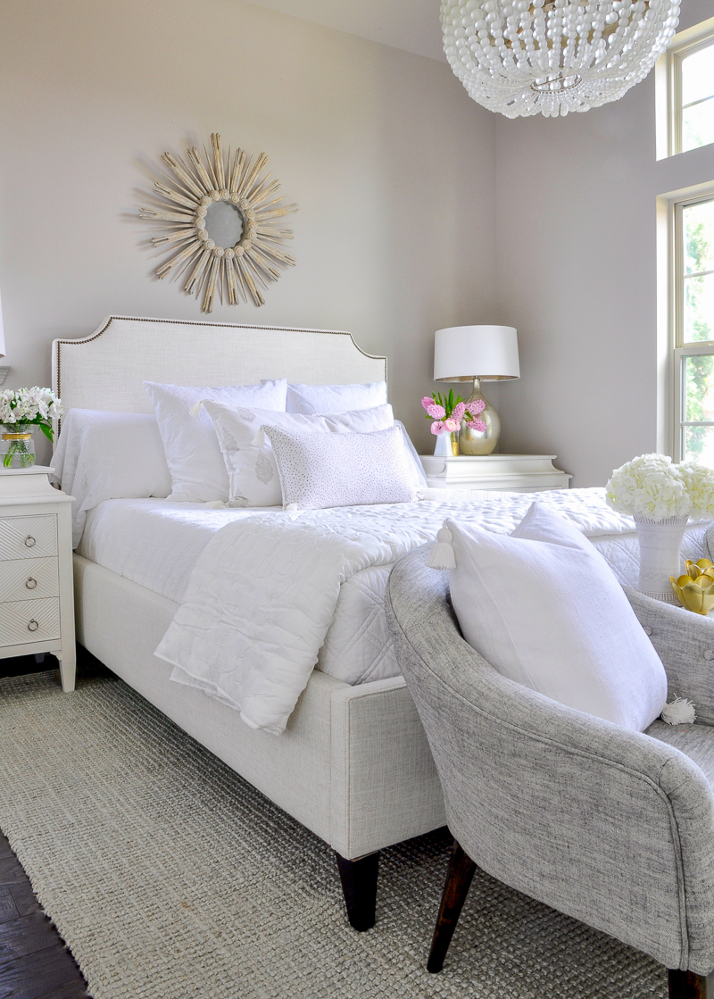 guest bedroom with white bedding