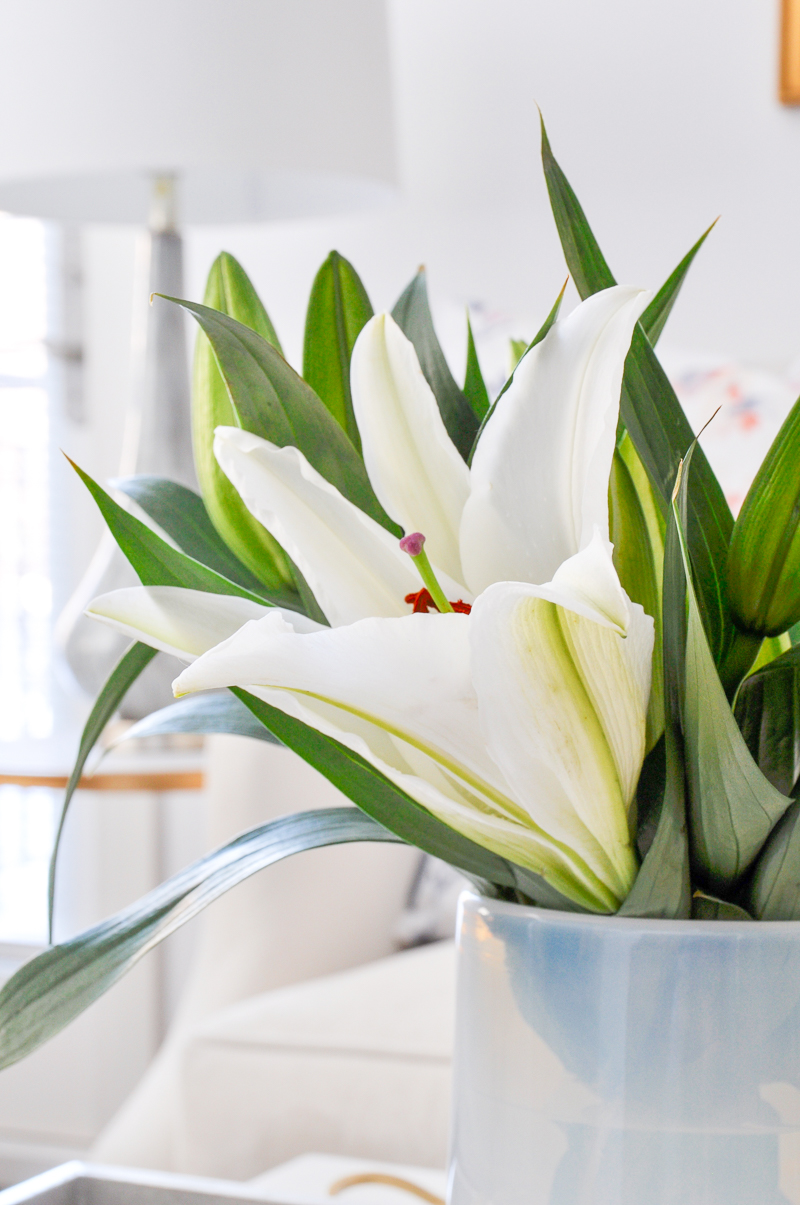 white vase with lilies