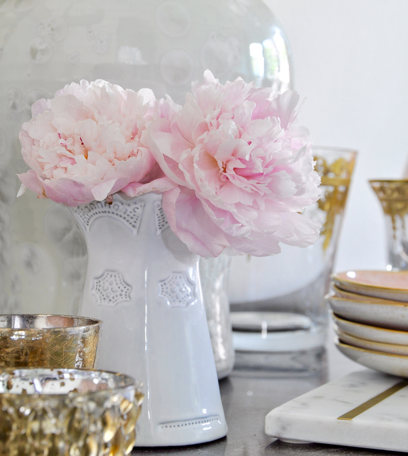 white vase with pink peonies