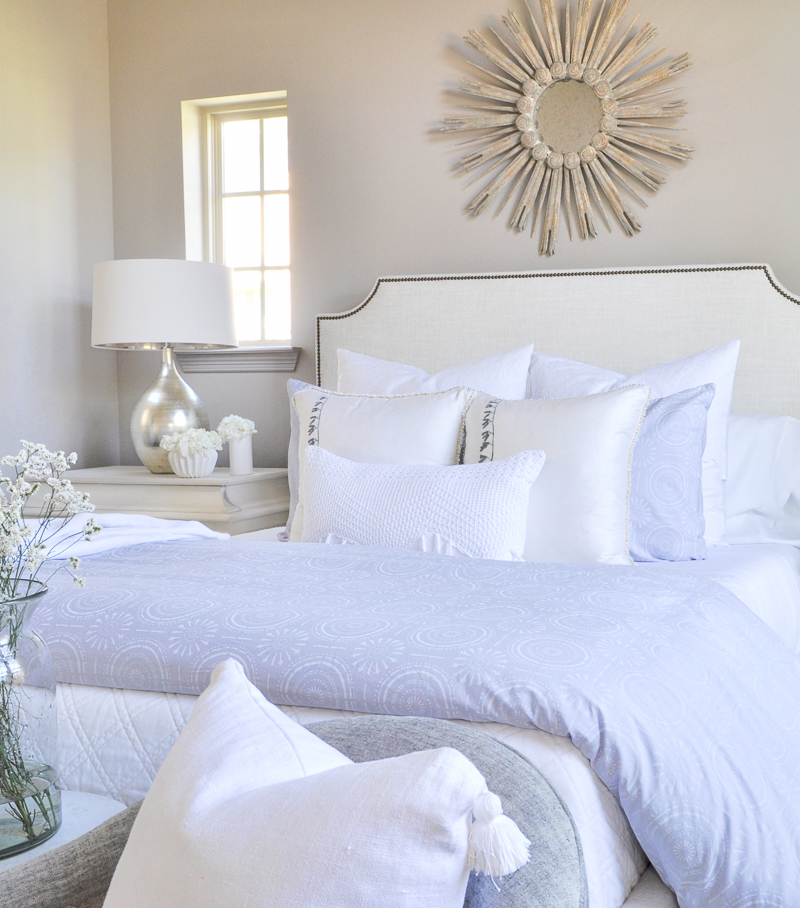 beautiful layered bed with white bedding white sheets