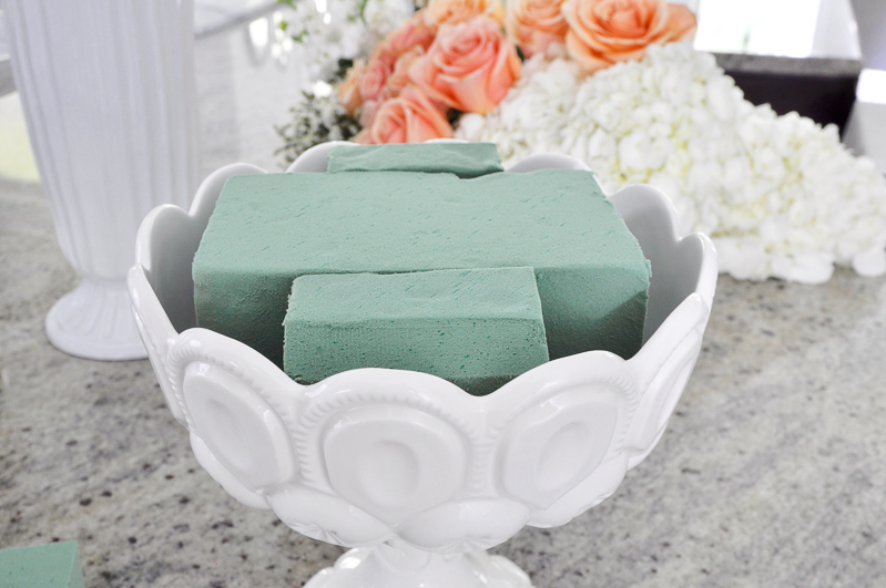 green wet foam in pedestal dish for flower arrangement