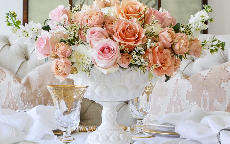 spring floral arrangement with blush and peach roses