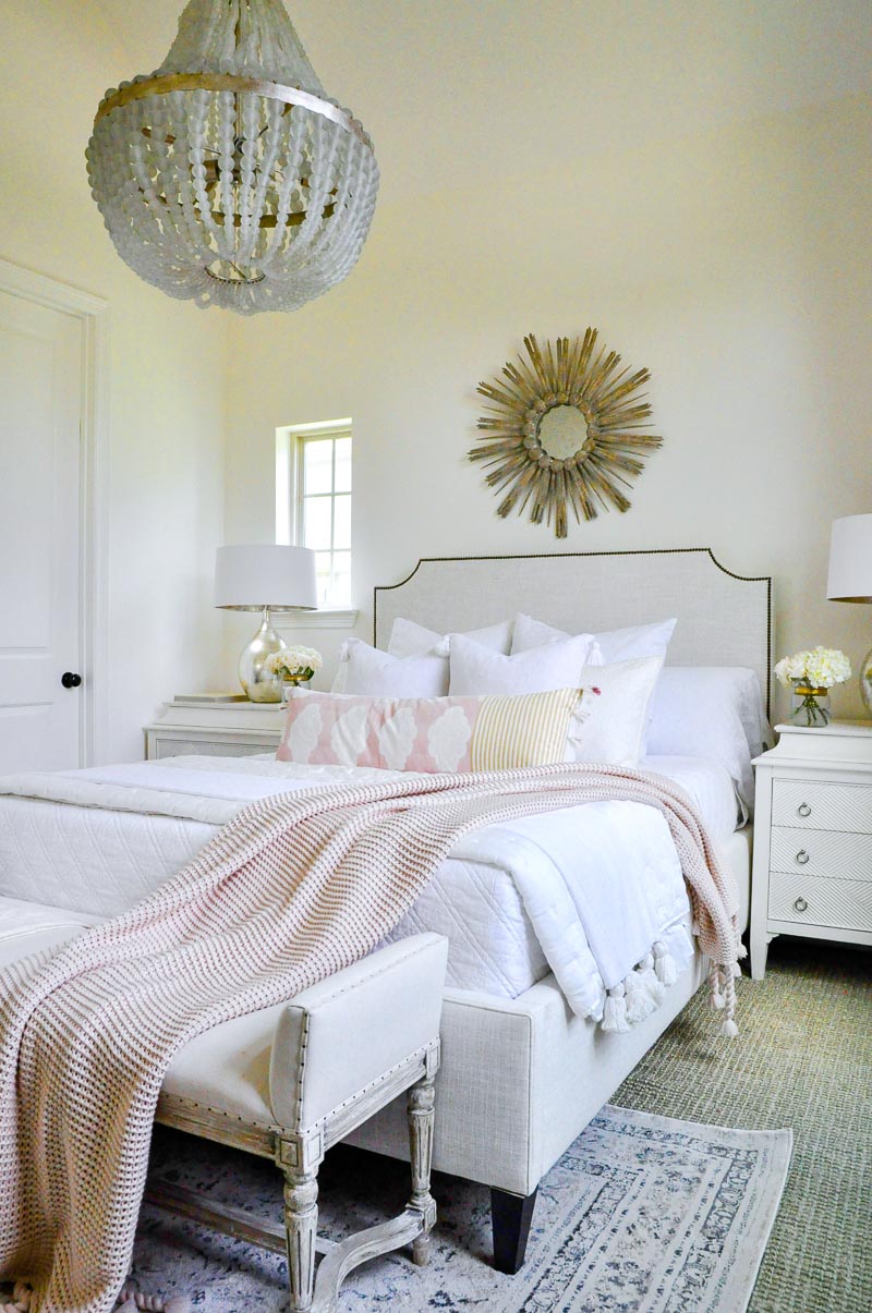 Dreamy white bedroom blush accents