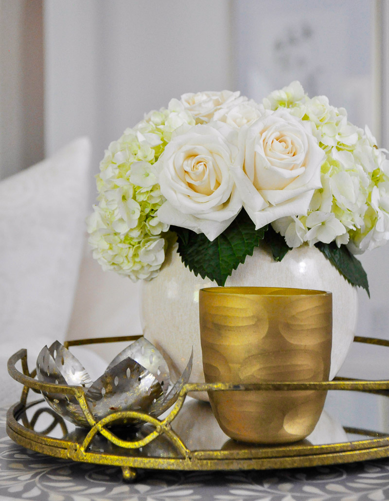 Gold tray home vignette