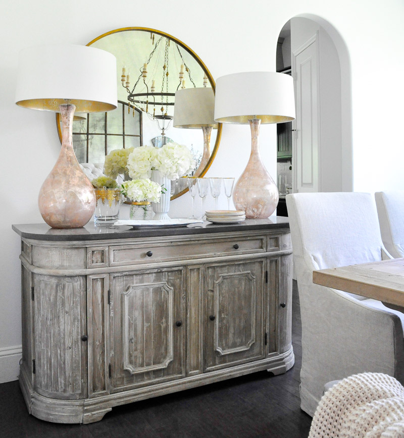 dining room console pink lamps round brass mirror 