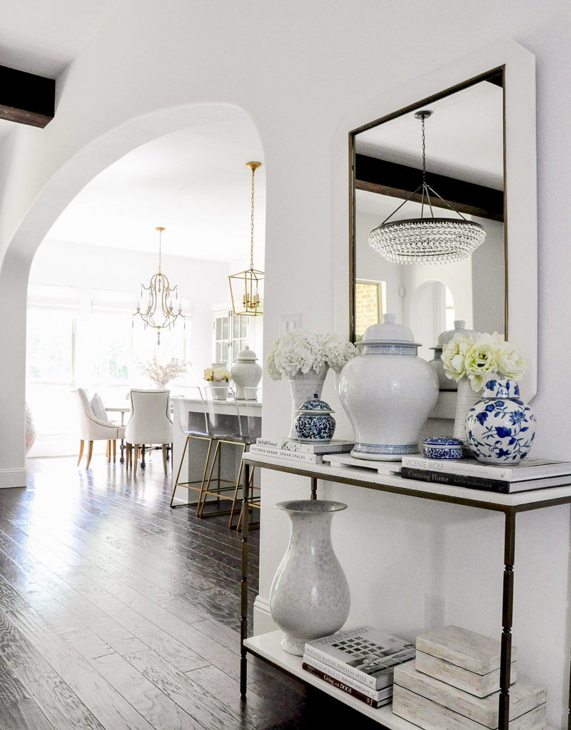 stylish entry hall console decorated ginger jars