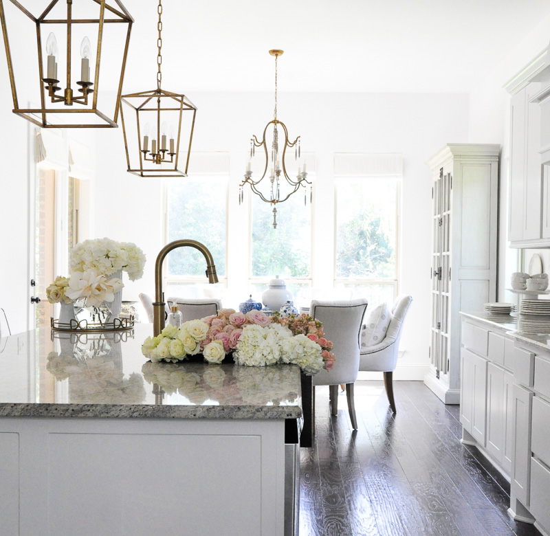 Beautiful white kitchen breakfast room gold accents