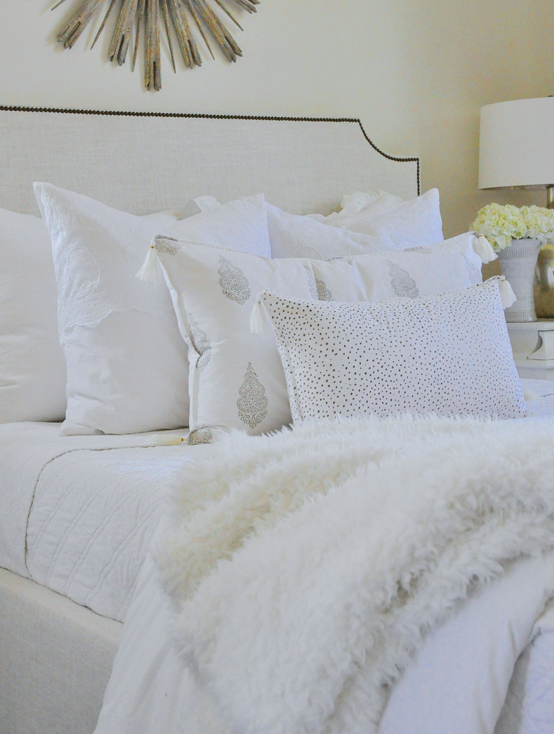 Beautiful white bedding adds style 