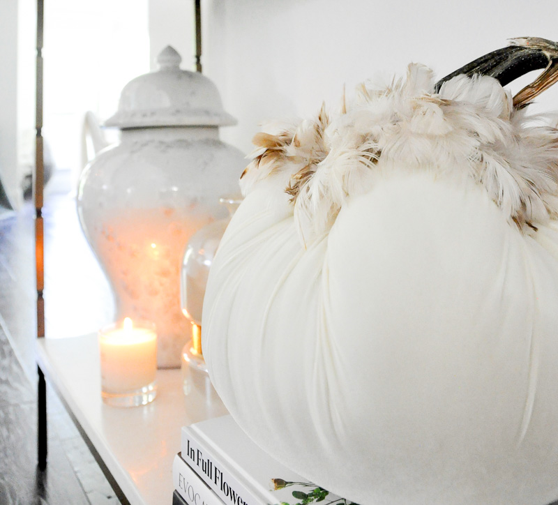 Console table fall decor white velvet pumpkin feathers 