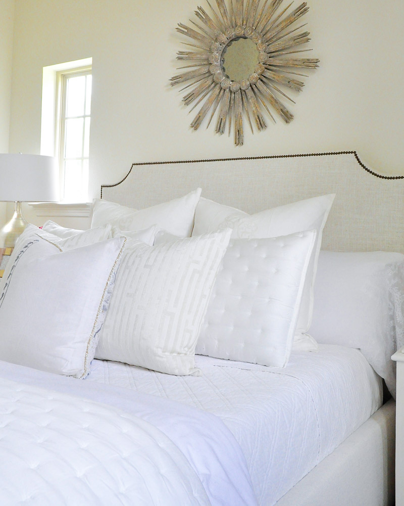 Beautiful overstuffed white pillows. 