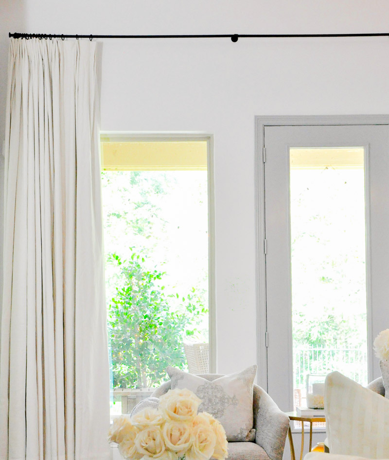 Beautiful white living room drapery panels