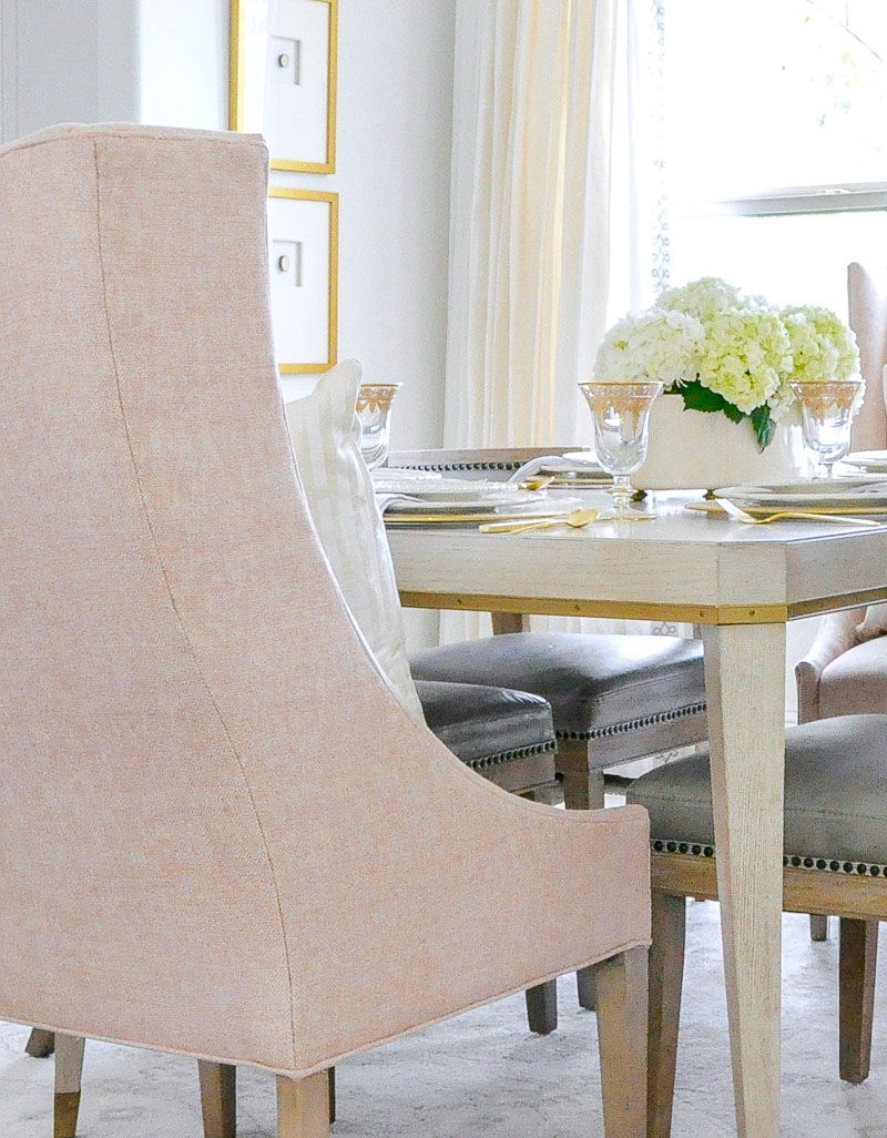 Bright inviting dining room blush chair